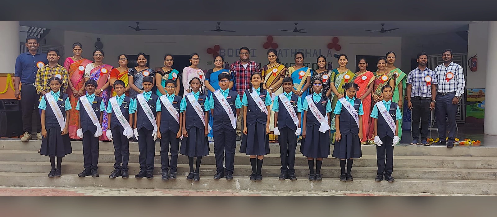 Student leaders with school staff