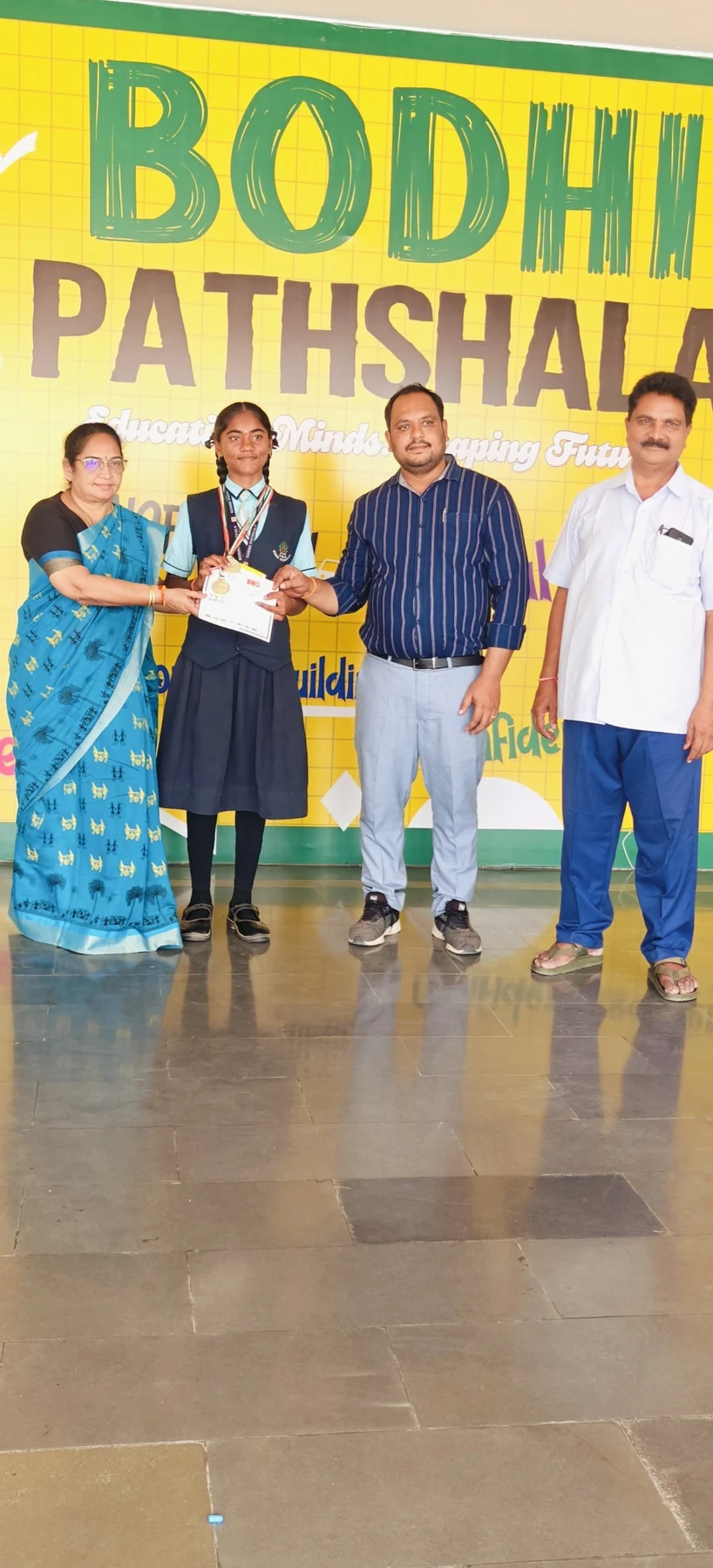 A student receiving recognition for achievement