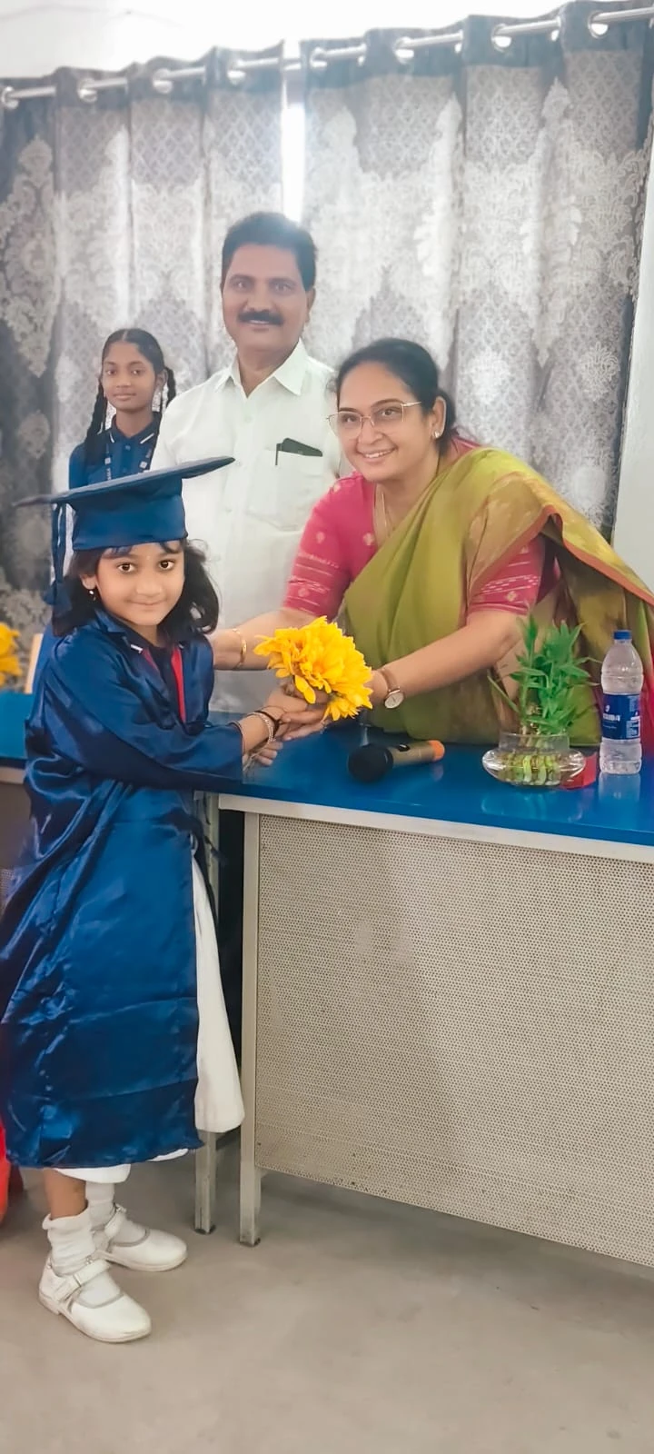 A young graduate receiving a warm welcome