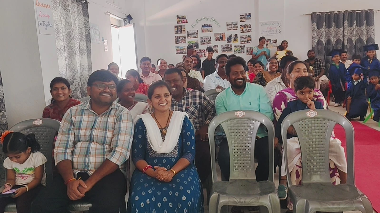 Families sharing joyful moments at a school event